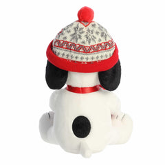 Aurora Snoopy stuffed animal wearing holiday hat, ideal as a cozy gift for Peanuts fans.