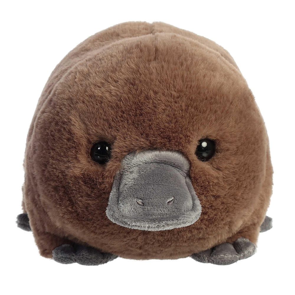 Aurora Spudsters Pongo Platypus plush in warm brown with gray feet for tactile warmth.