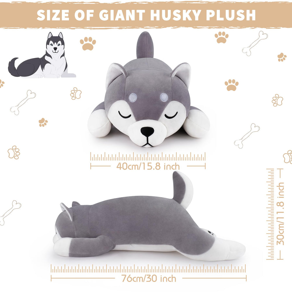 Auspicious Beginning husky plush pillow with closed eyes invites comforting naps and dreams.