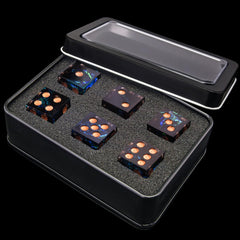 AUSTOR game-night setup with dark star dice for tabletop sessions.