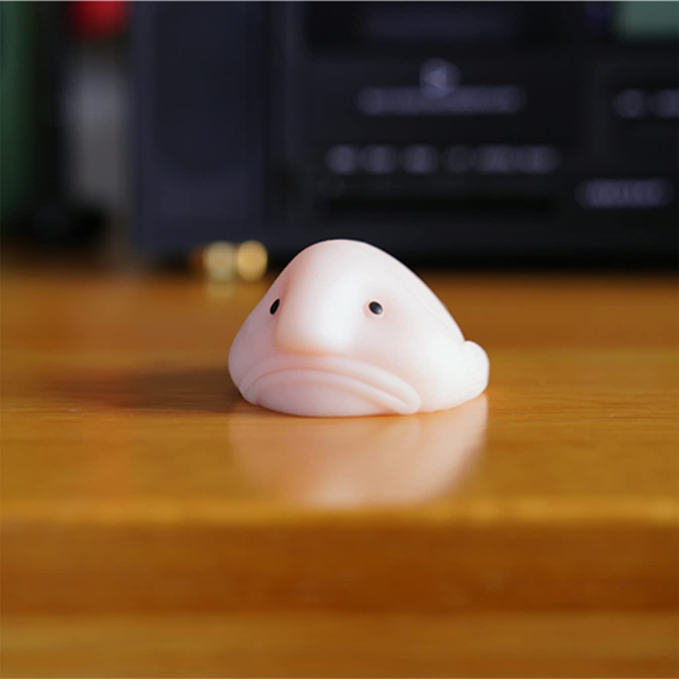 AWANGLUO blobfish toy in an office setting for focus and calm