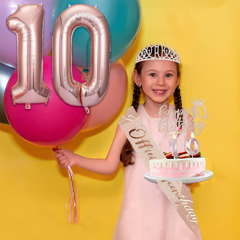 Awfrky rose gold numeral balloons creating a festive 10th birthday backdrop.
