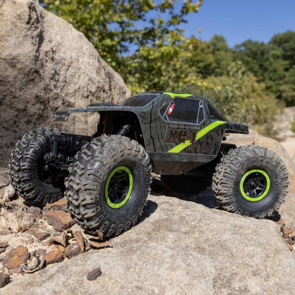Axial AX24 XC-1 Rockster wheels provide solid traction on rocky terrain.