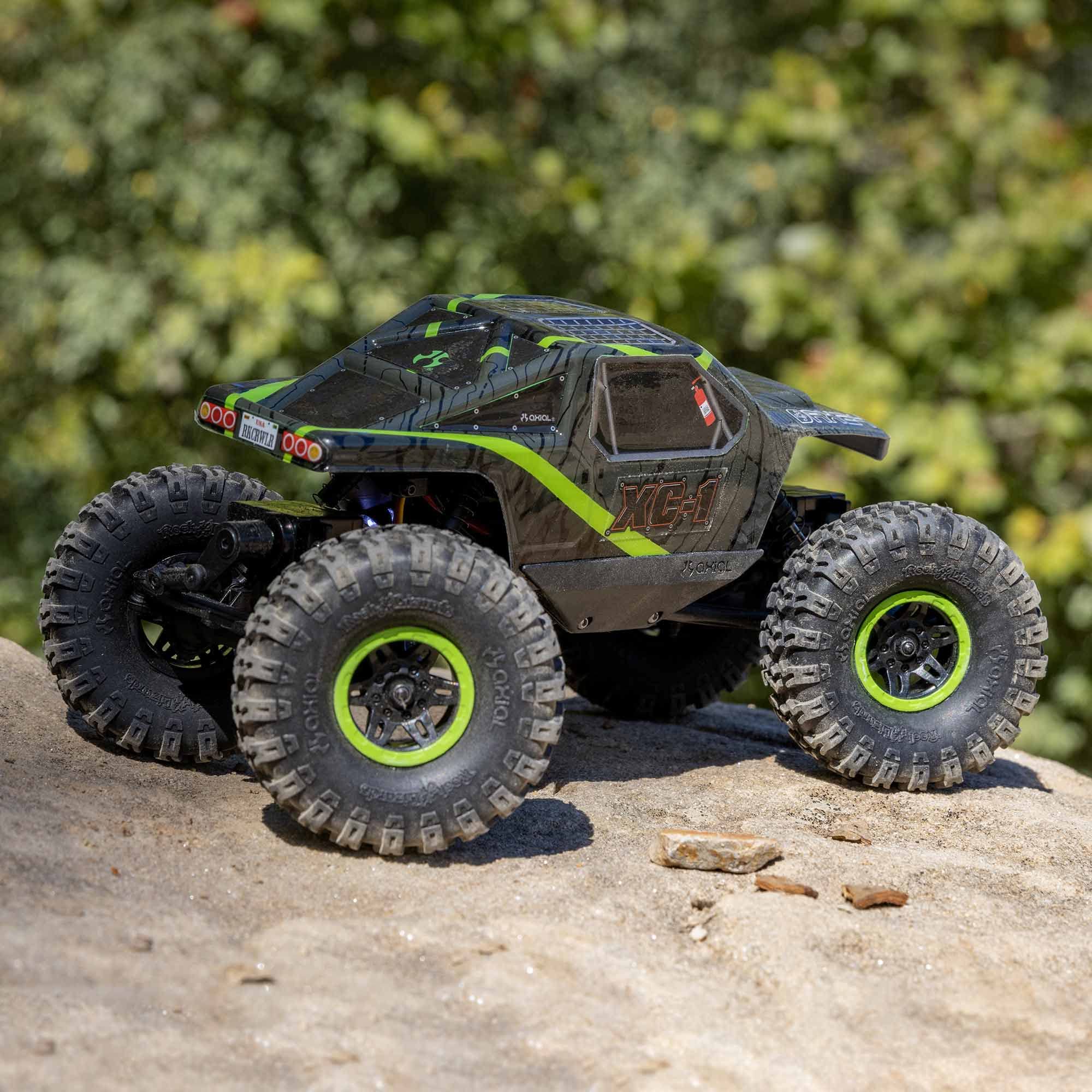 Axial AX24 XC-1 side chassis articulation enhances stability on uneven surfaces.