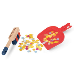 B. toys Clean n' Play wooden brush fosters careful brushing in role play.