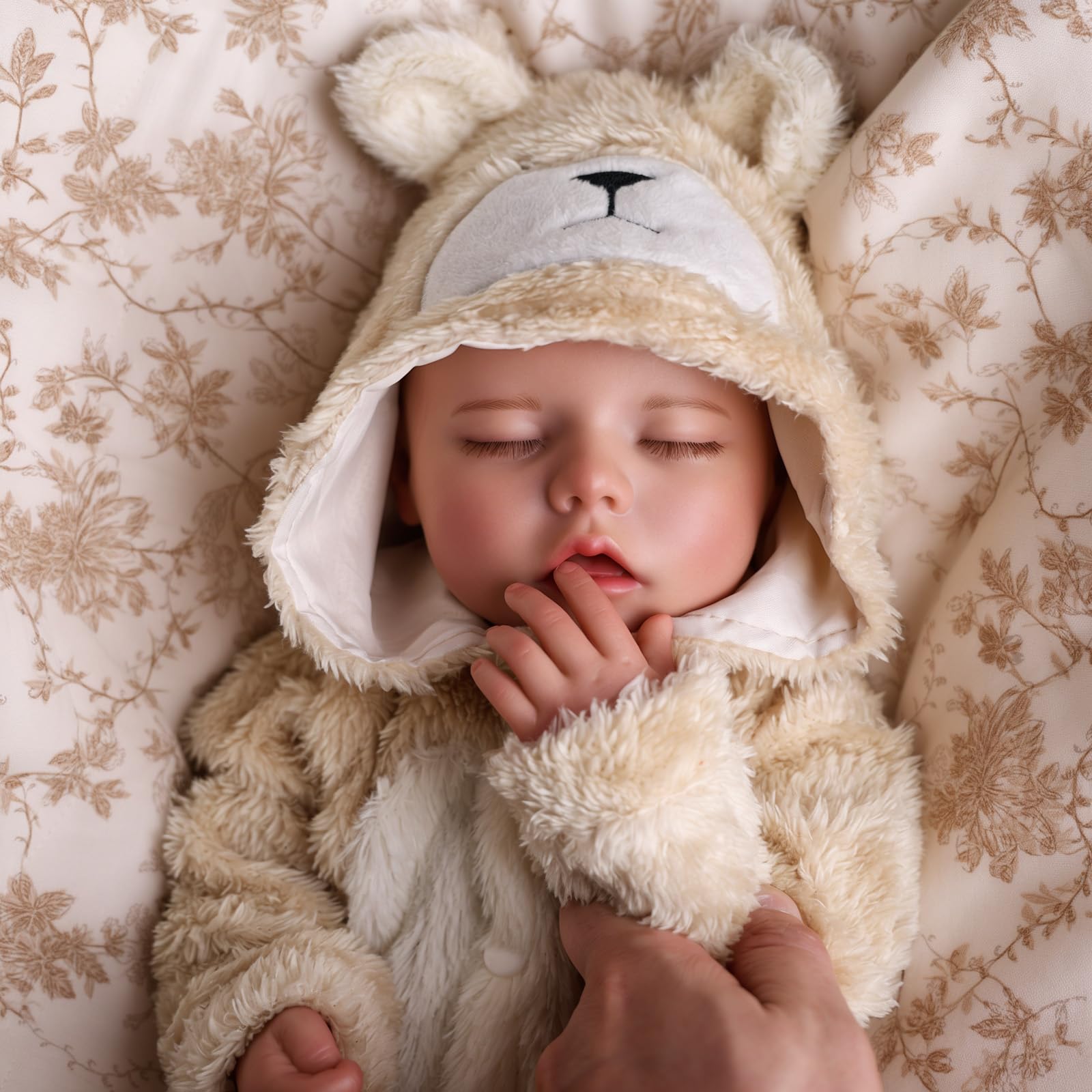 BABESIDE drink and wet doll demonstrates realistic hydration play and potty action.