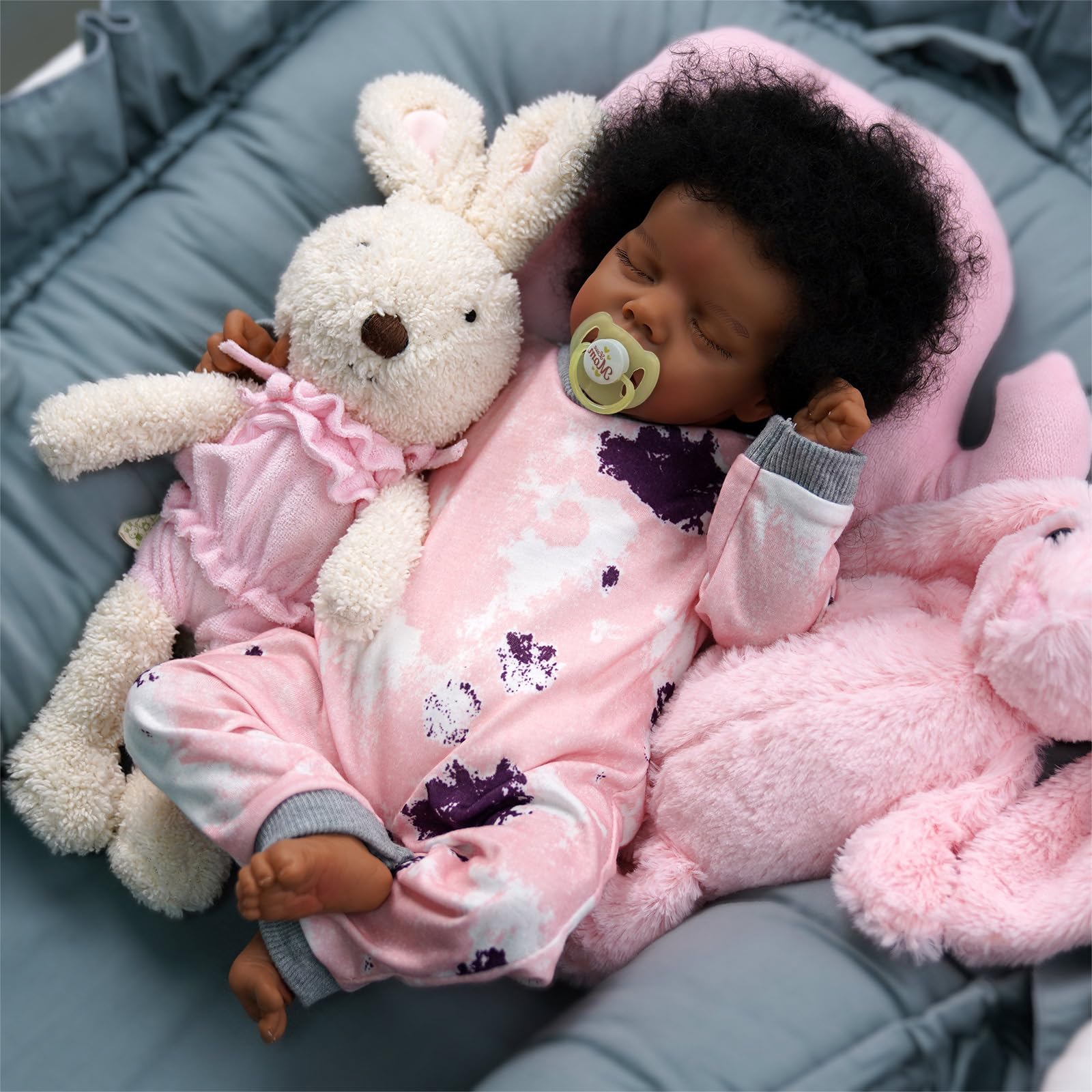 BABESIDE lifelike reborn doll with a black face close-up, showing detailed facial features.