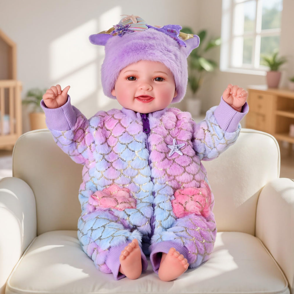 BABESIDE Mia lifelike vinyl head and hands offer realistic detail for cuddly play.