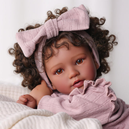 BABESIDE Callie doll hands show poseable limbs for nurturing cuddles and lifelike interaction.