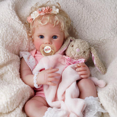 BABESIDE Reborn doll engaged in dress-up activity for storytelling
