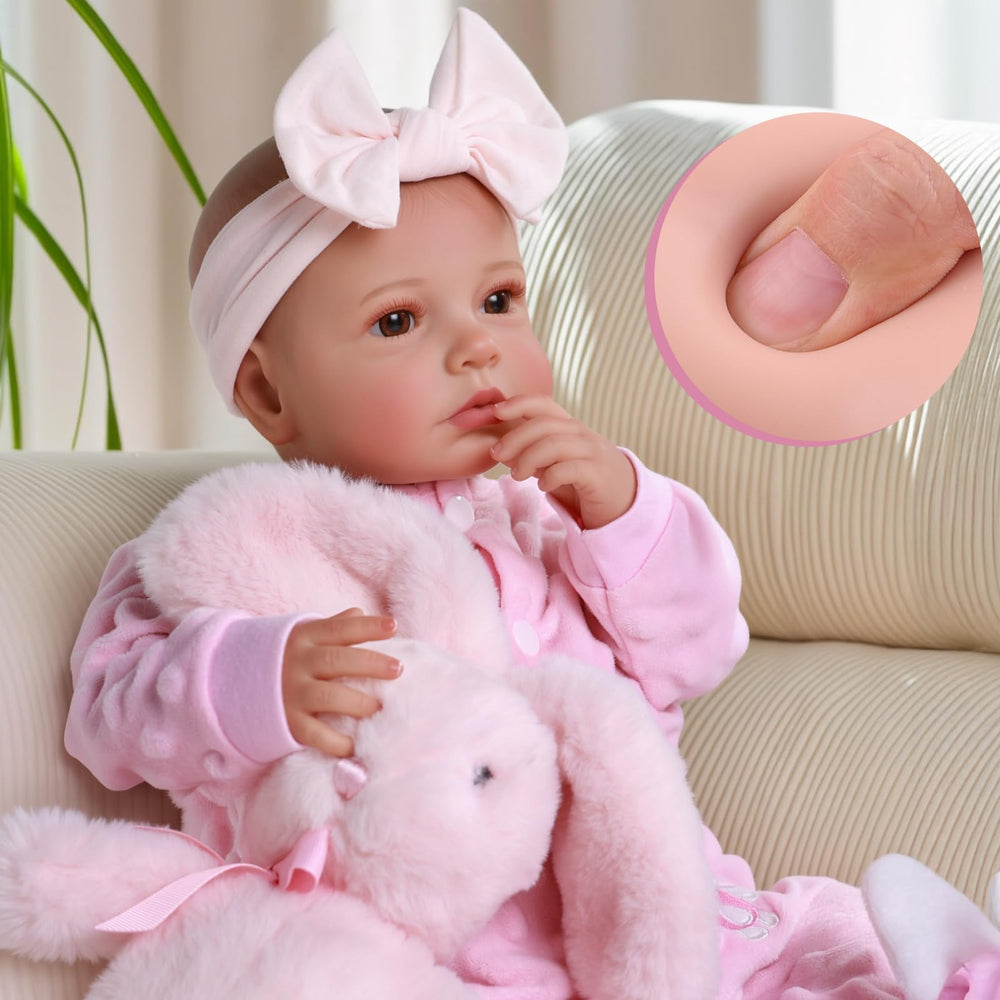 BABESIDE reborn baby doll face closeup with lifelike details for imaginative play.