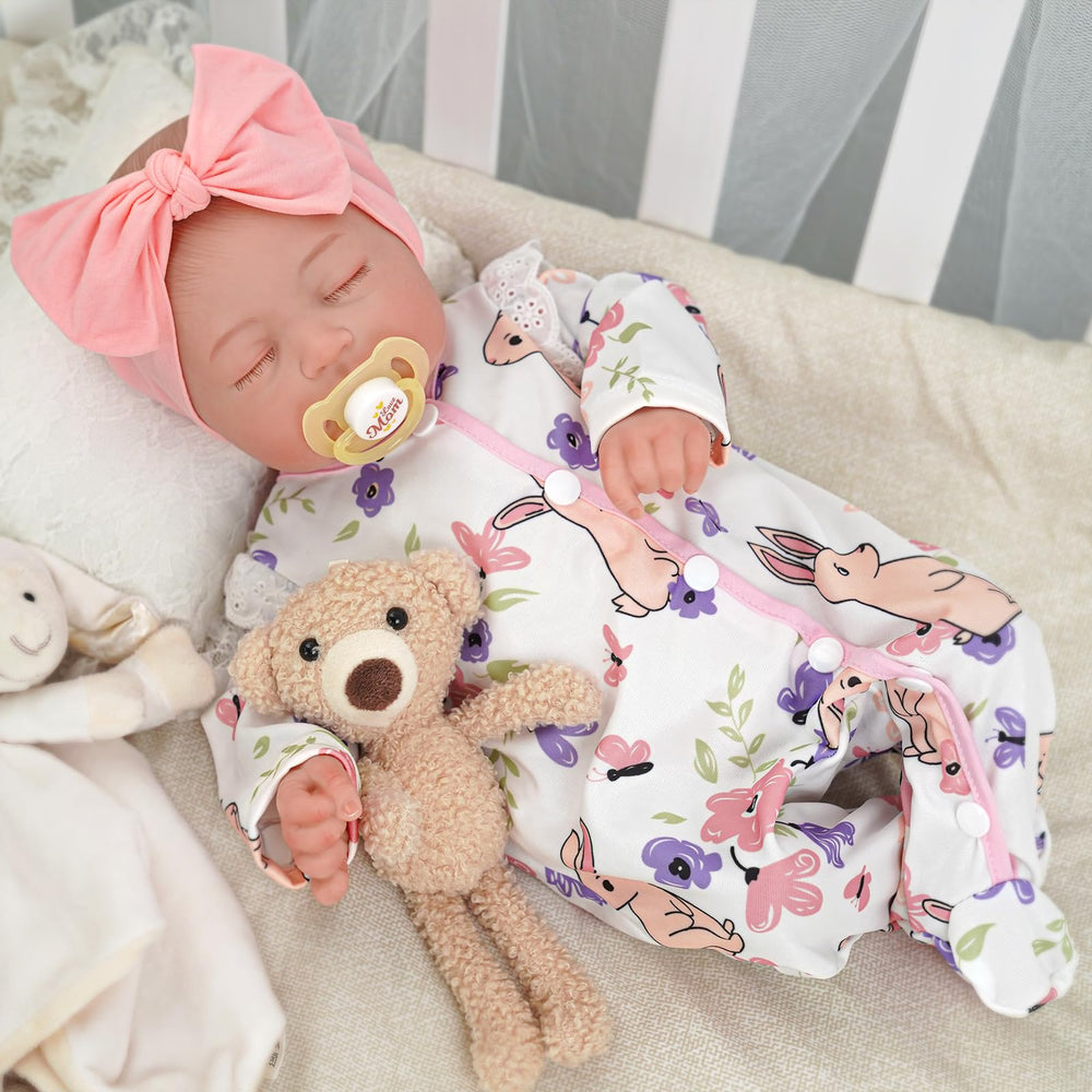 BABESIDE Reborn Baby Doll Girl in pink outfit with headband for cuddling and pretend play.