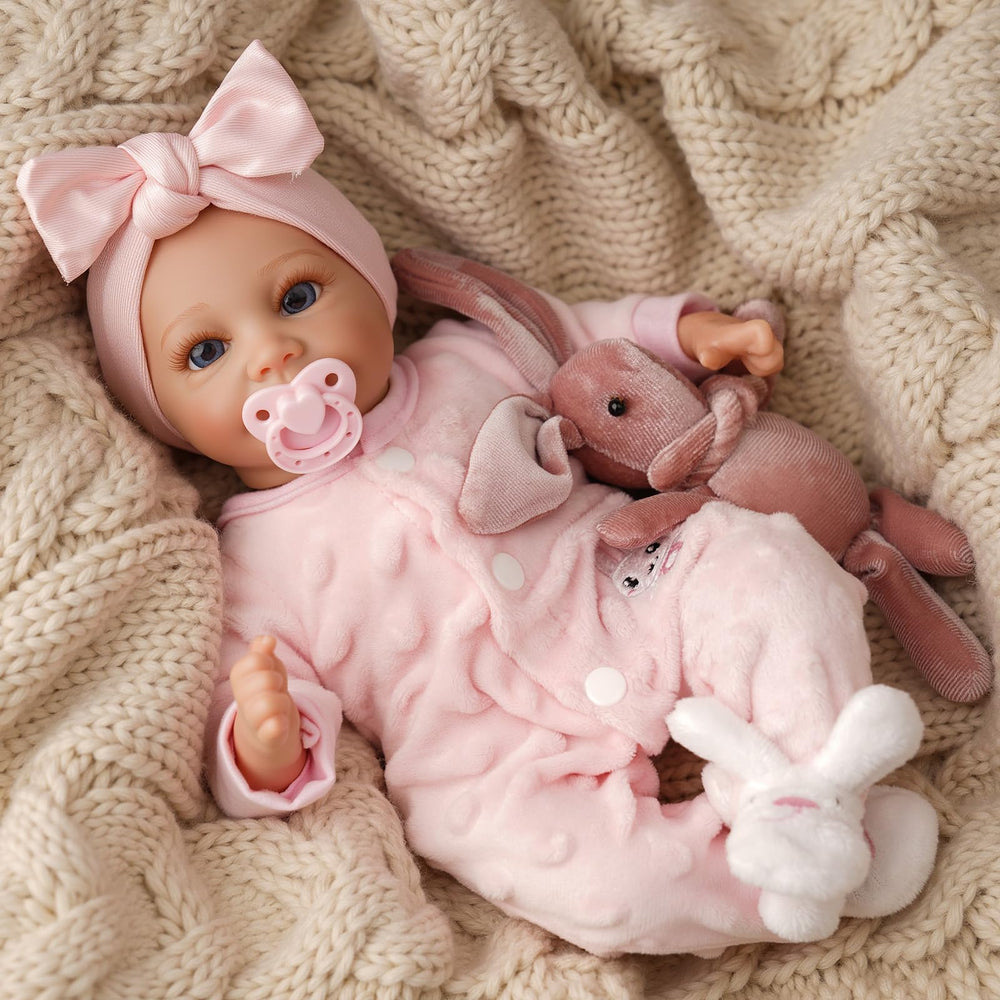 Babeside soft vinyl body allows posing for cuddling and nurturing play.