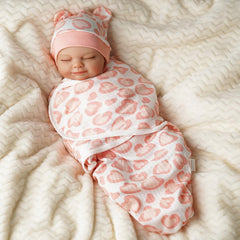 BABESIDE swaddle set laid out for easy dressing.