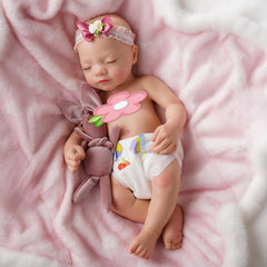 BABESIDE weighted 4lb silicone doll for a comforting hold and true-to-life heft.