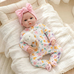 Babesnug birth certificate and accessories included with the doll