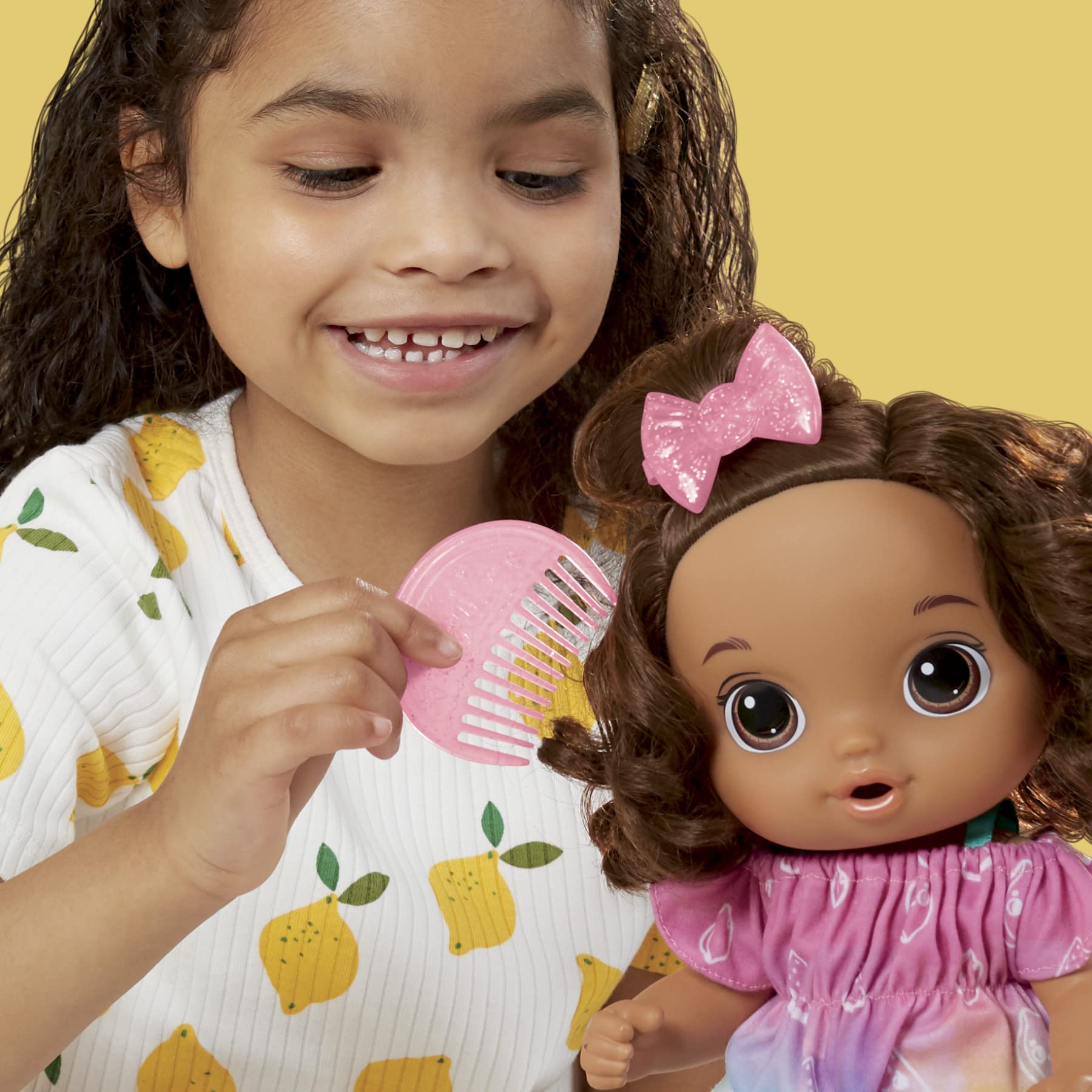 Baby Alive Fruity Sips 12-inch doll profile view.