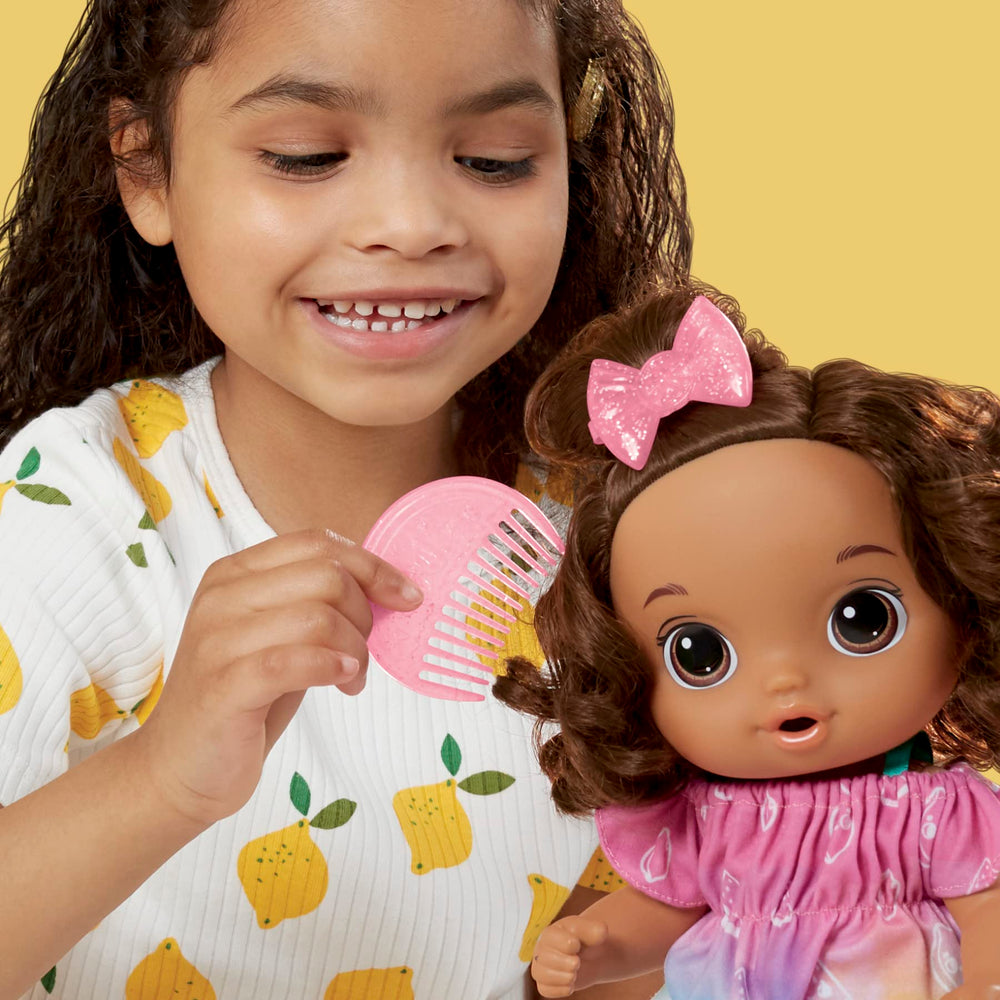 Baby Alive Fruity Sips 12-inch doll profile view.