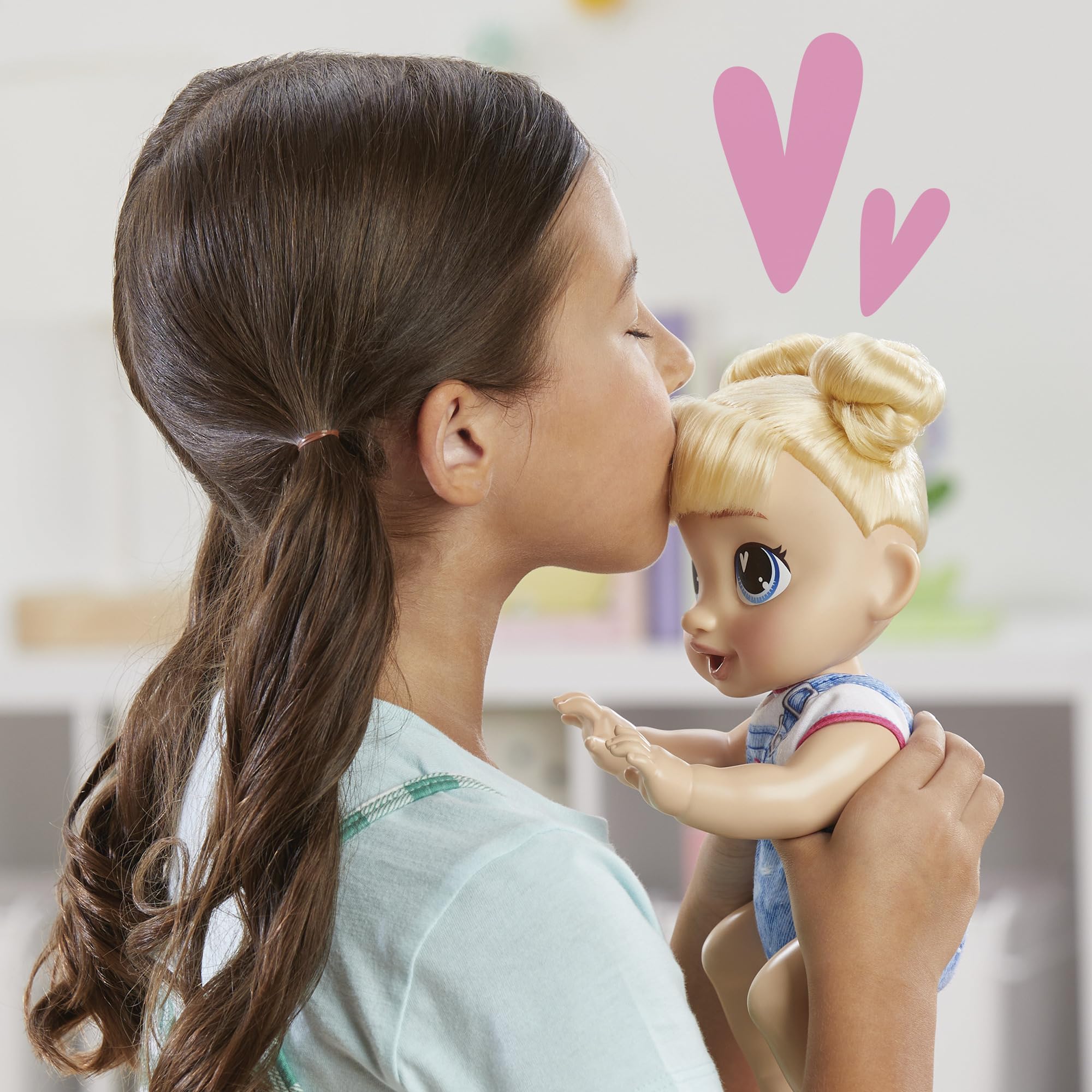 Removable onesie on Harper Hugs supports easy dressing up play.