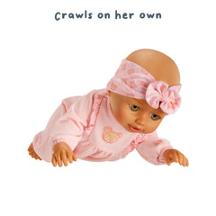 Sitting and moving: Olivia kicks and waves arms while making adorable baby sounds