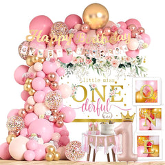 Baby Girl 1st Birthday Decorations balloon boxes showcase a coordinated pink and gold centerpiece for easy party styling