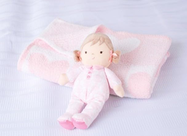 Pink damask bow on Brigitte doll from Baby Starters adds charm