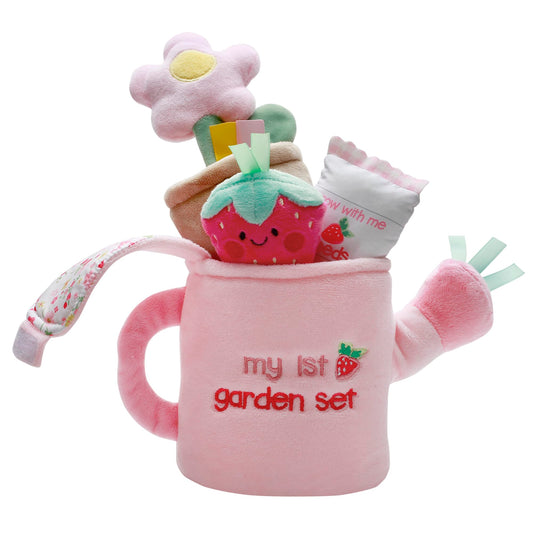 Baby Starters plush strawberry with rattle enhances sensory exploration during playtime.
