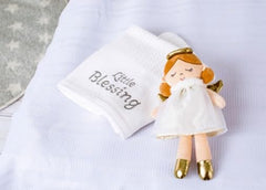 Stella angel doll with golden wings, a charming baptism keepsake and travel companion.
