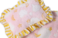 Doll tucked in Baby Whitney Pink Clouds blanket for snugly play