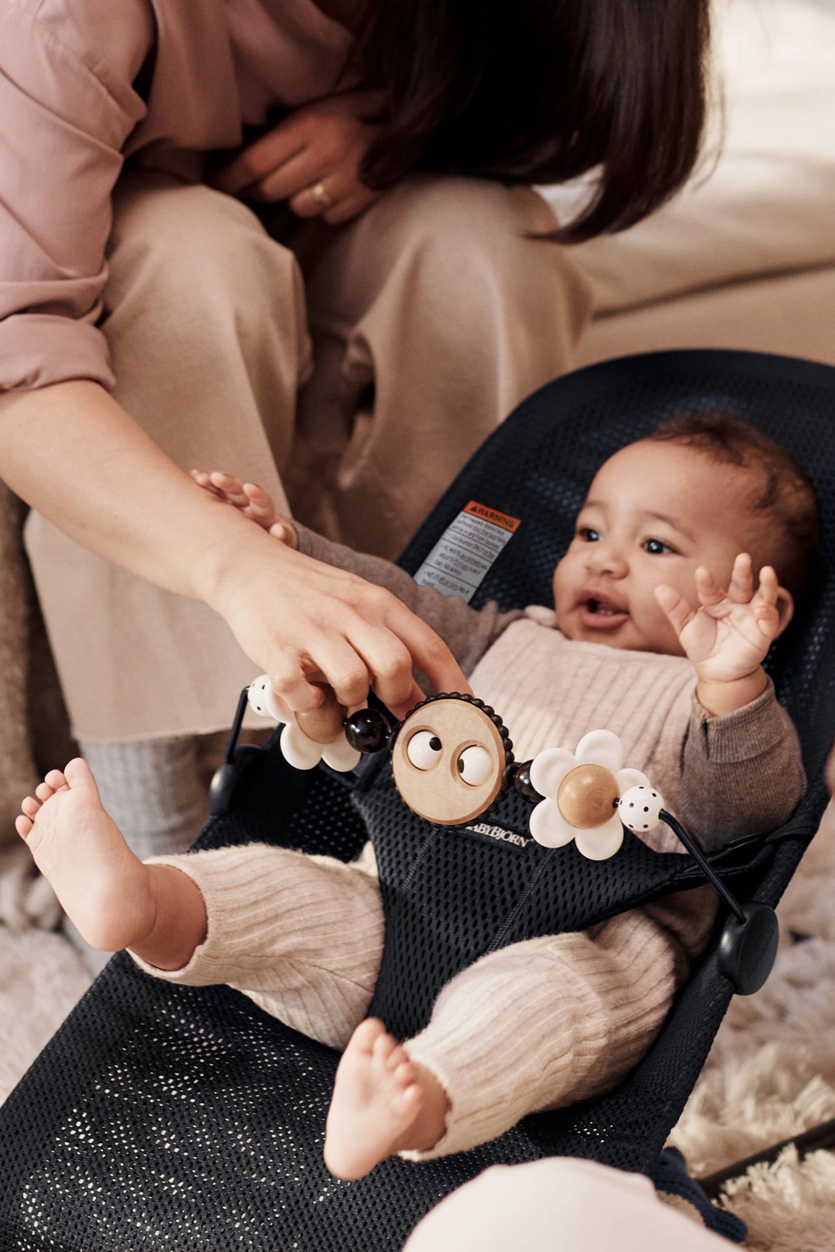 BabyBjorn Toy Bar Spin enables easy spin action during playtime