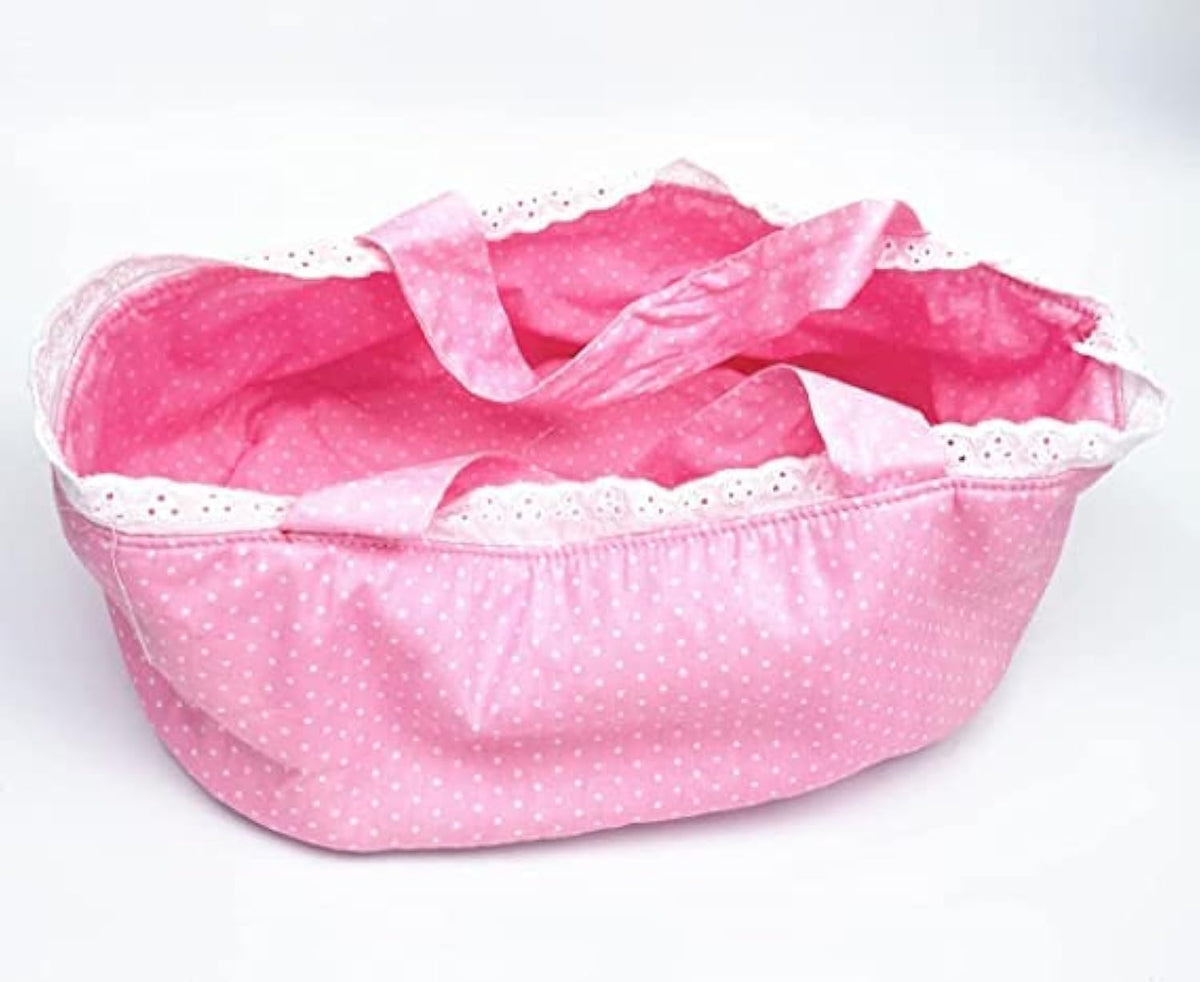 Babyfere Reborn doll basket pink with handle for easy transport.