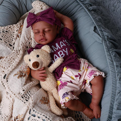 BABESIDE diaper and rattle to support nurturing play