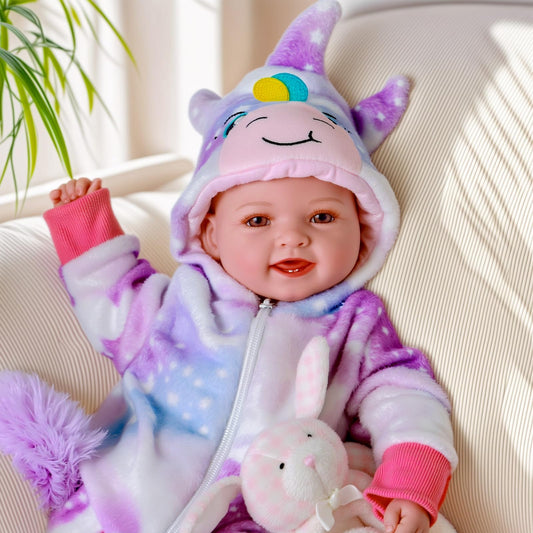 BABESIDE Mia 15-inch doll inviting gentle hugs and nurturing pretend play.
