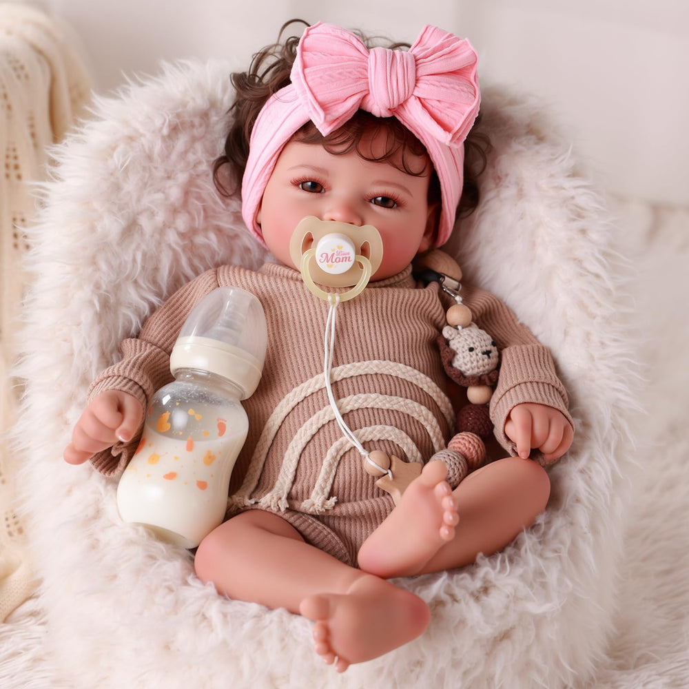BABESIDE Mia gentle blush and pacifier-ready mouth for realism.