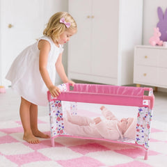 Babyside Reborn baby doll bed pink pattern promotes imaginative play.