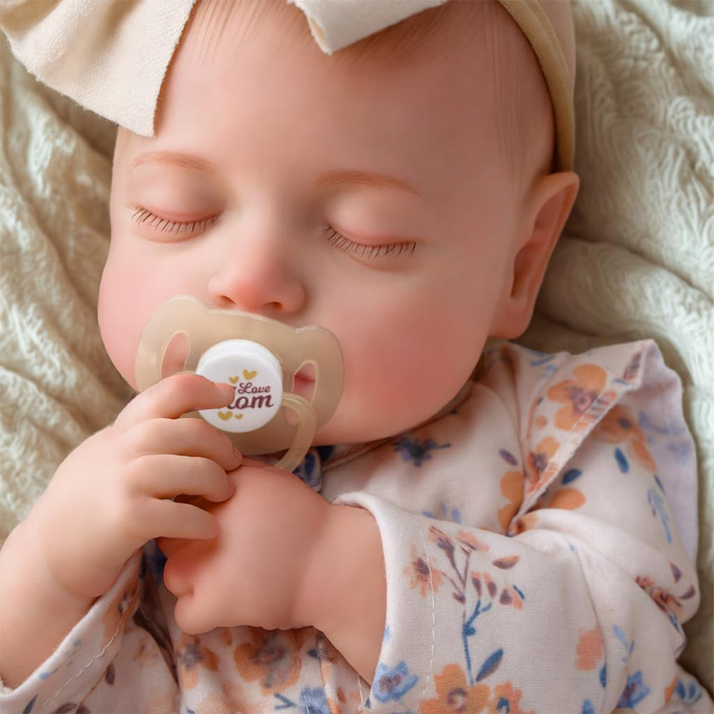BABESIDE Reborn doll posed sleeping pose inspires calm pretend play.