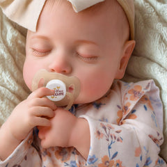 BABESIDE Reborn doll posed sleeping pose inspires calm pretend play.