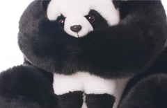 Backlood Toys 4-inch baby panda fits small hands for grasping adventures.