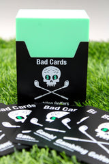 Bad Cards Fore Gambling Golfers cart-strap securing the game for quick access.