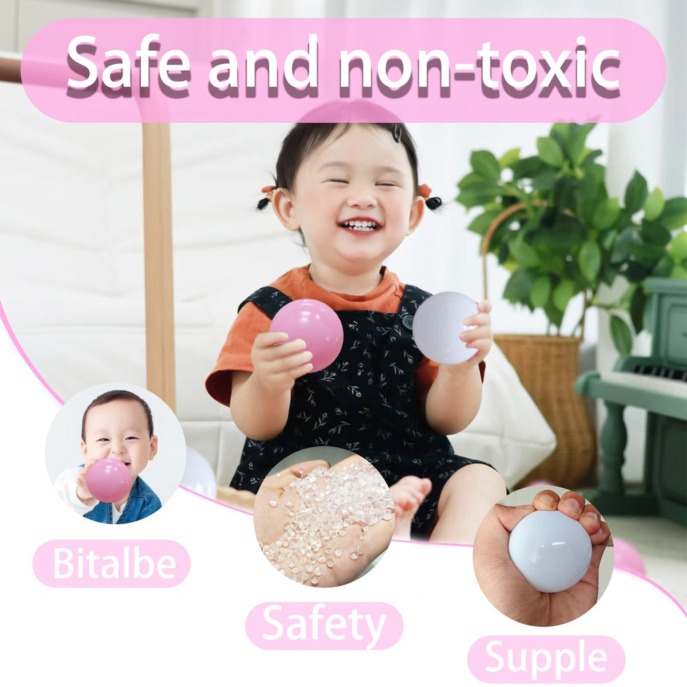 Bright pink and white balls support color recognition and learning.