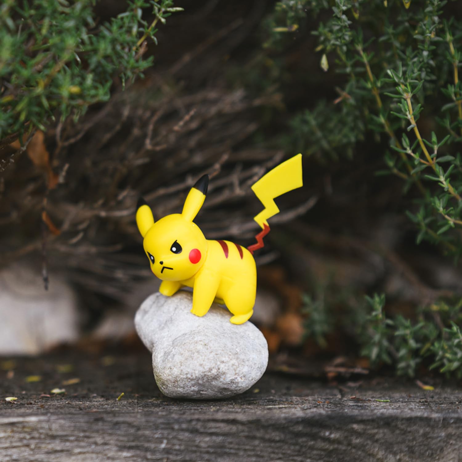 Bandai Pokémon Pikachu pose 4 figure in a curious, ready-to-play pose.