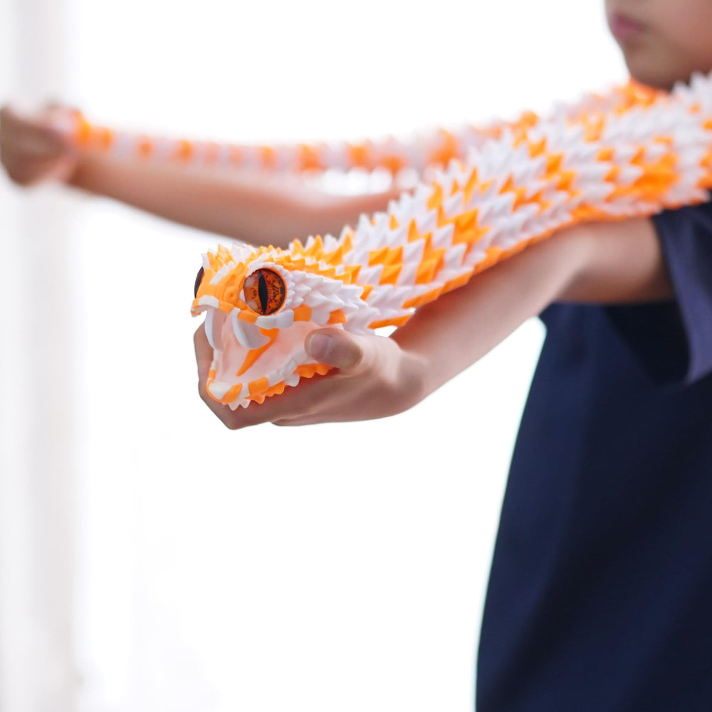 BANPIWOLG length comparison showing 47.5-inch snake scale against ruler