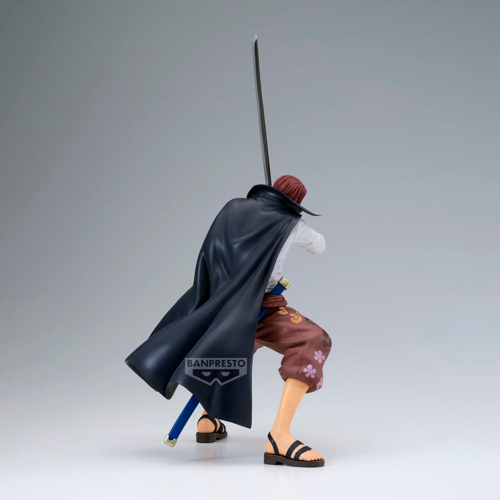 Banpresto Grandista Shanks figurine on desk adds focal point.