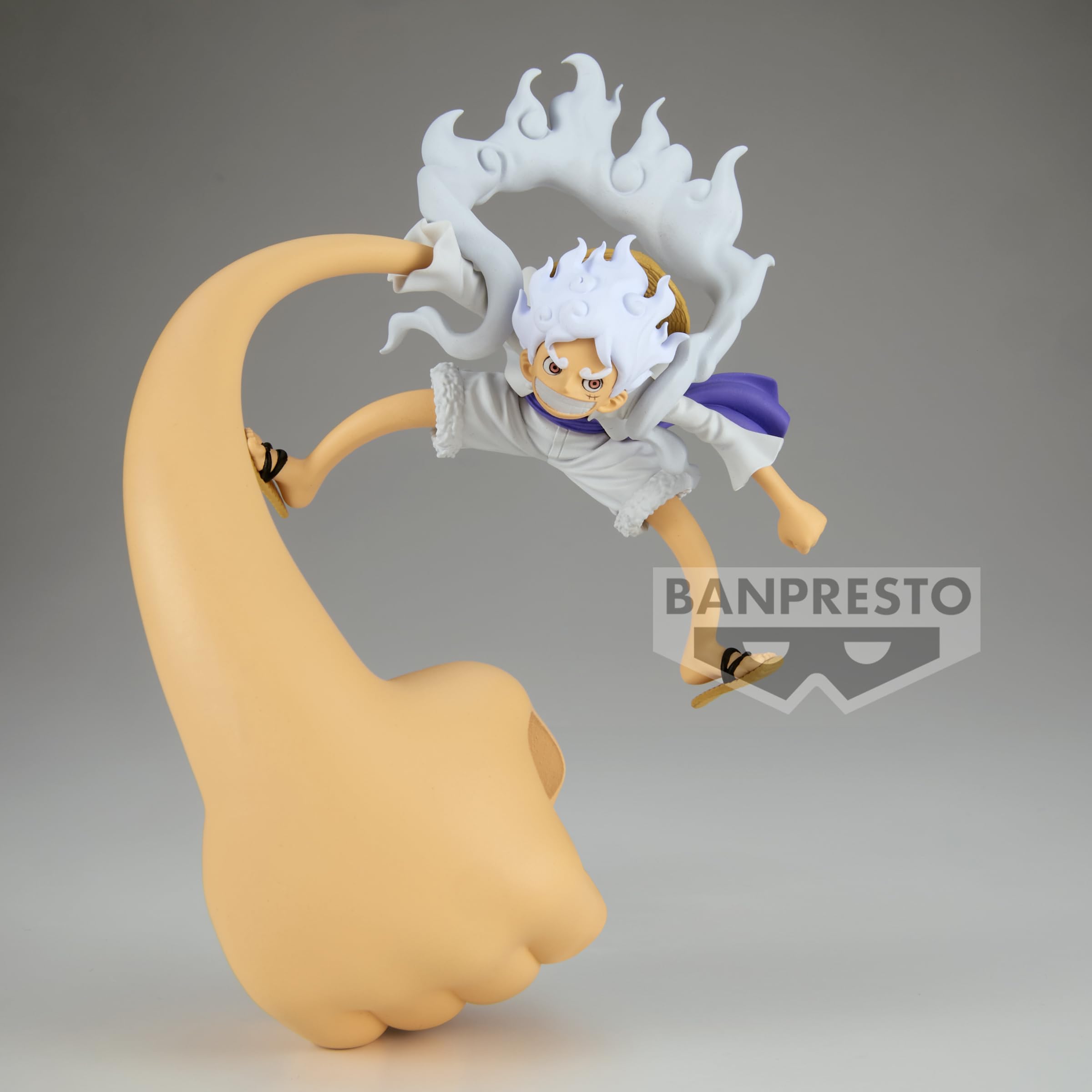 Banpresto Luffy Gear 5 figure holding a stationary accessory for dramatic tabletop display