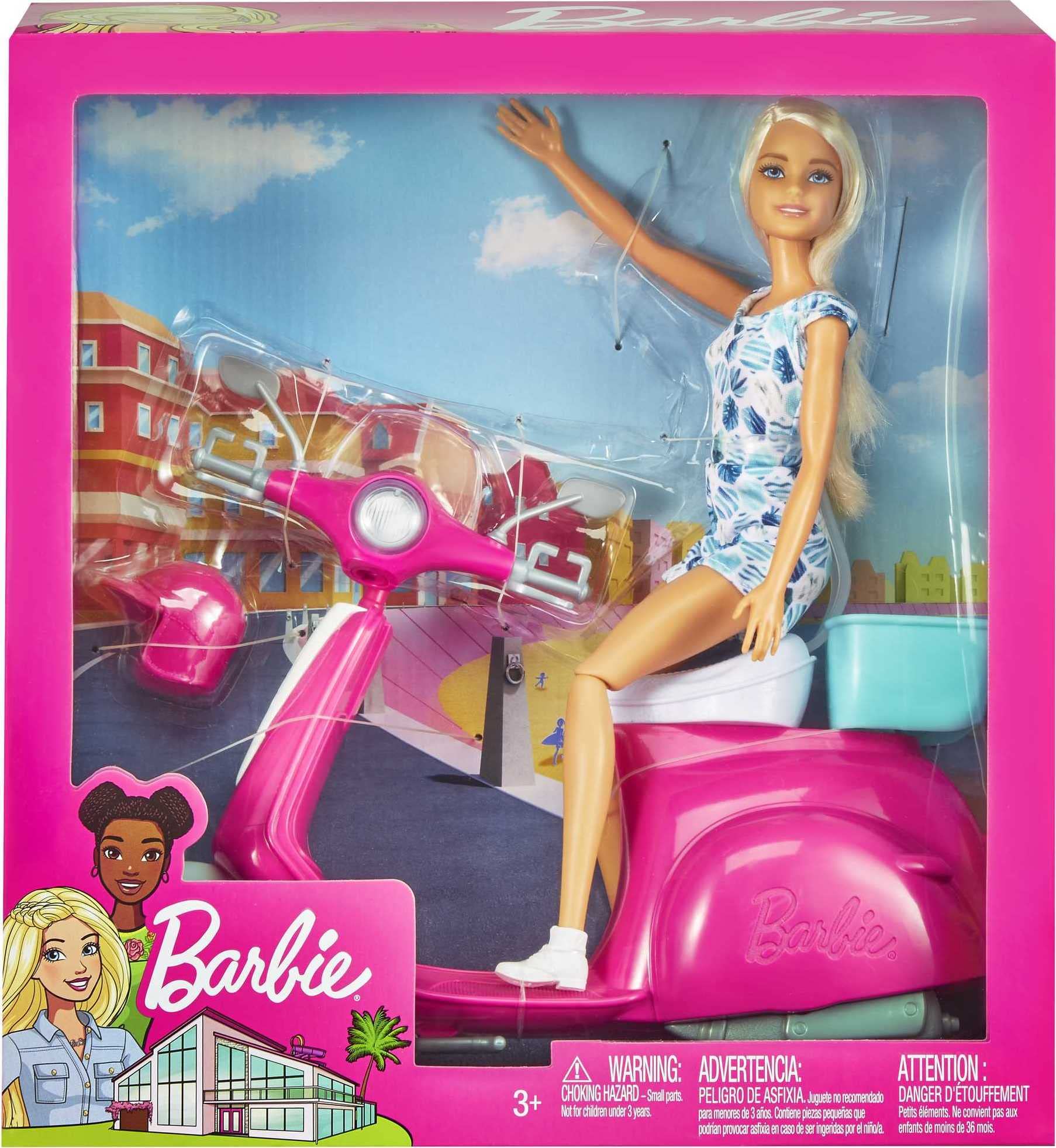 Barbie doll in printed romper and helmet ready for travel-themed play.