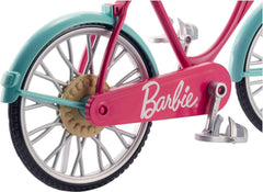 Barbie bicycle doll-seat clip keeps Barbie securely in place for pretend rides.