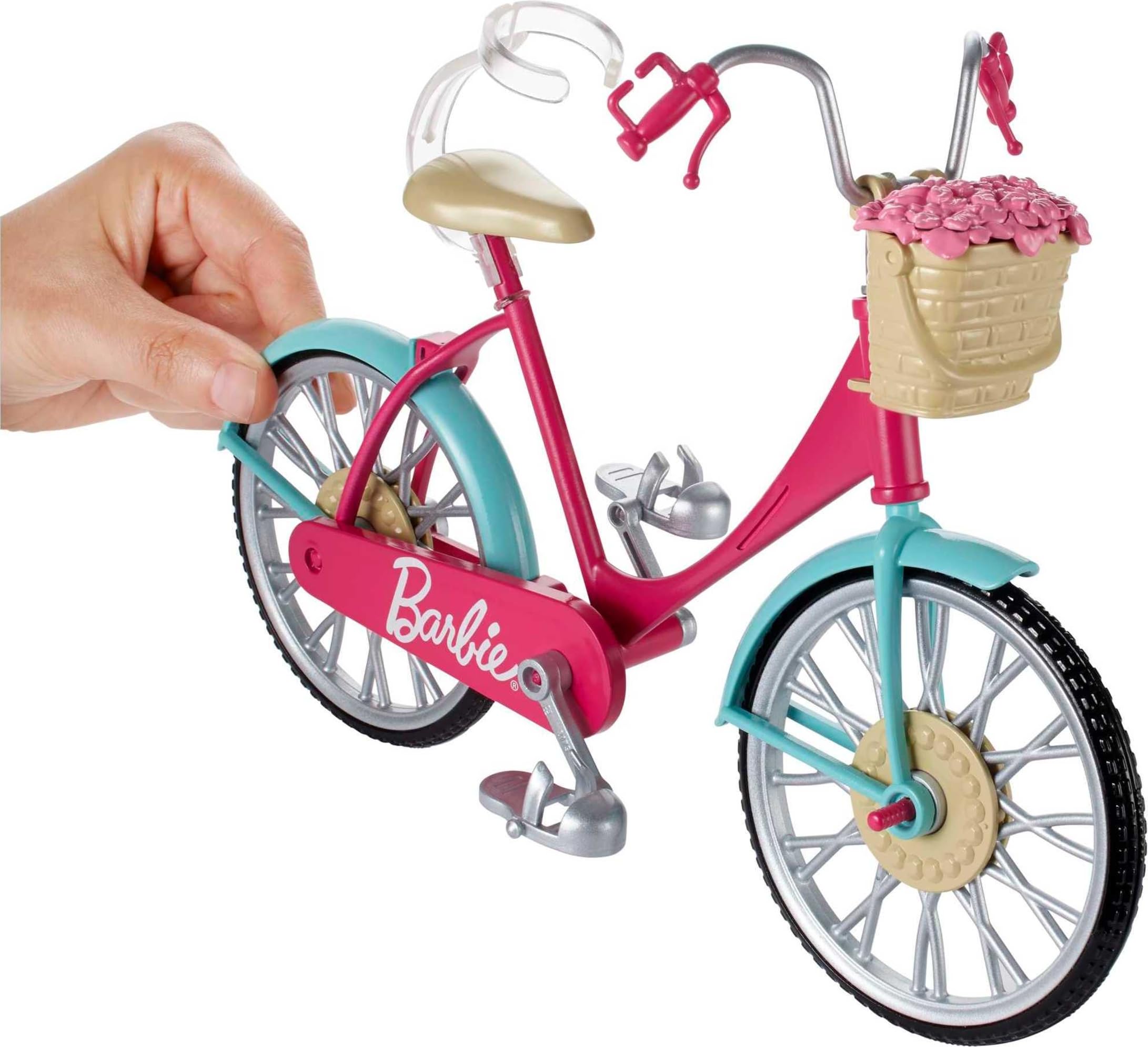 Barbie bicycle pink body with teal fenders for eye-catching style.