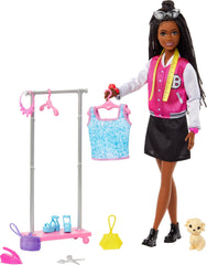 Barbie Brooklyn doll with clothing rack showing organized wardrobe play.