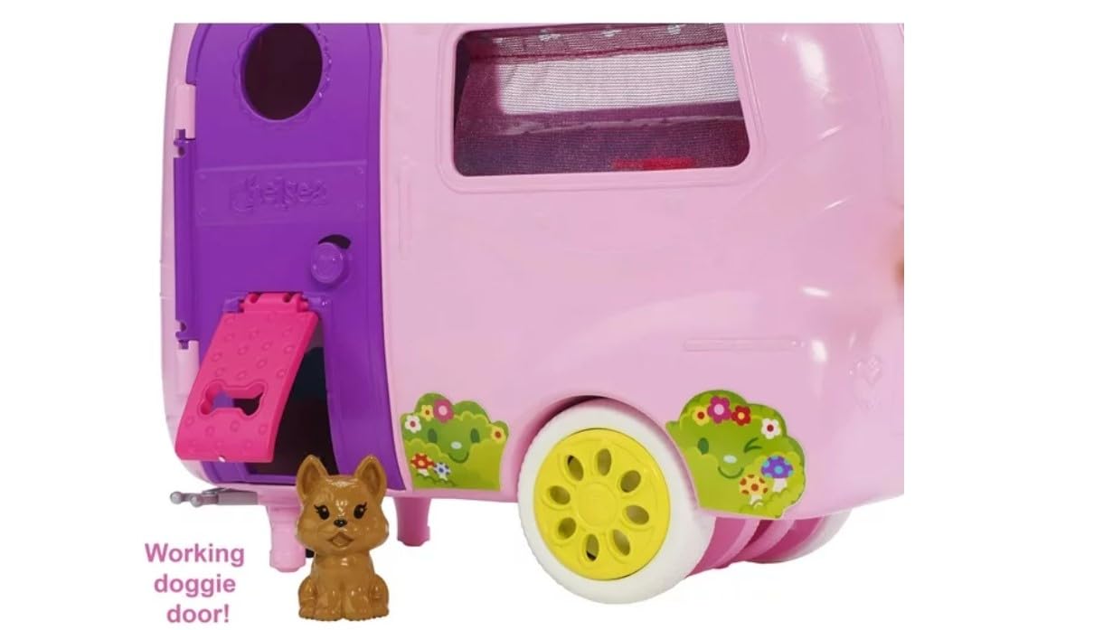 Barbie Chelsea doll seated in camper, ready for on-the-go adventures