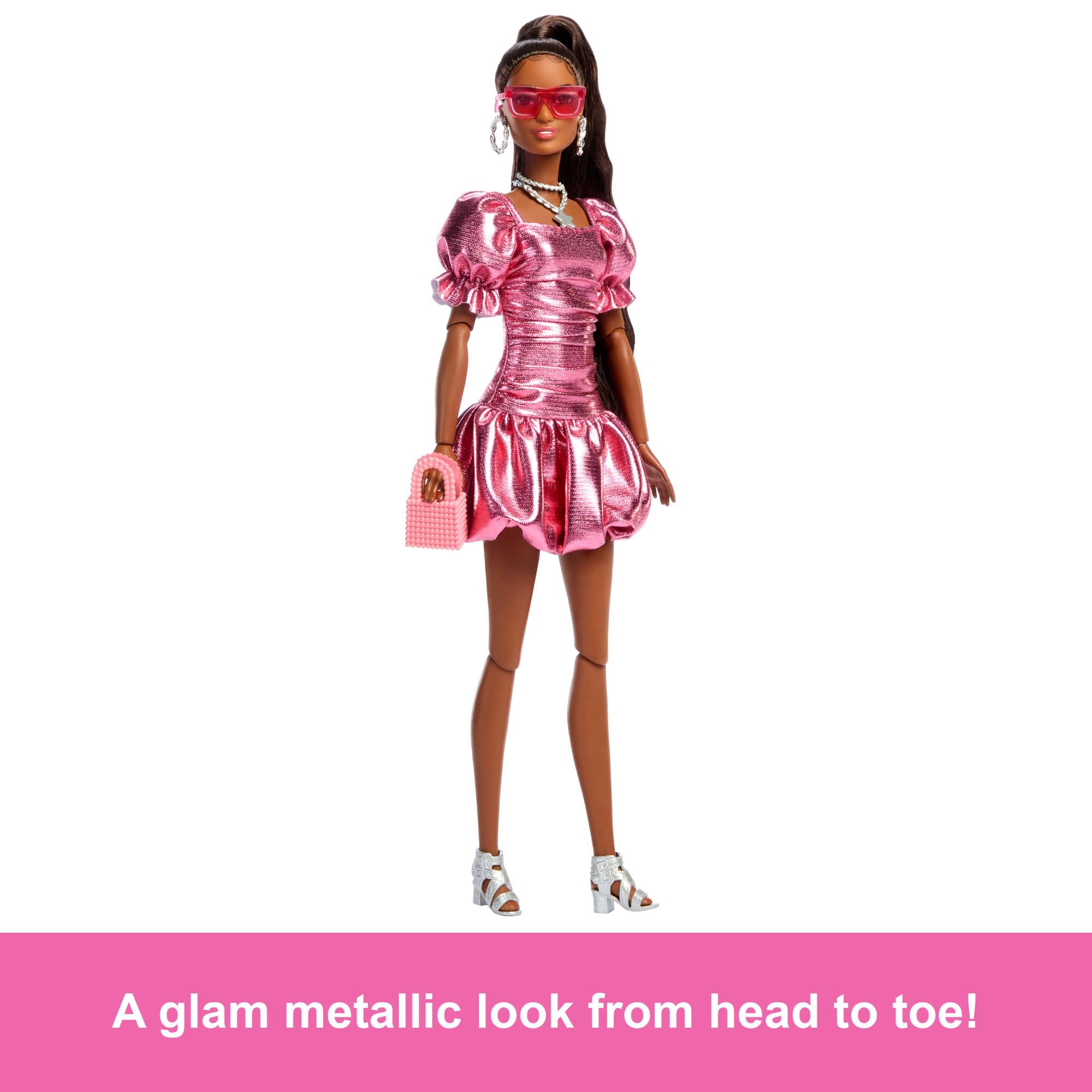 Barbie Deluxe Style Doll #6 wearing silver hoop earrings and layered necklace for glam detail.